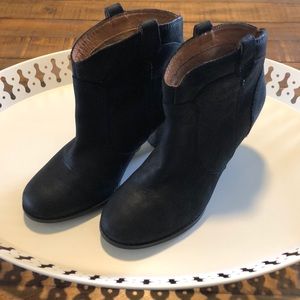 Clark’s black leather booties